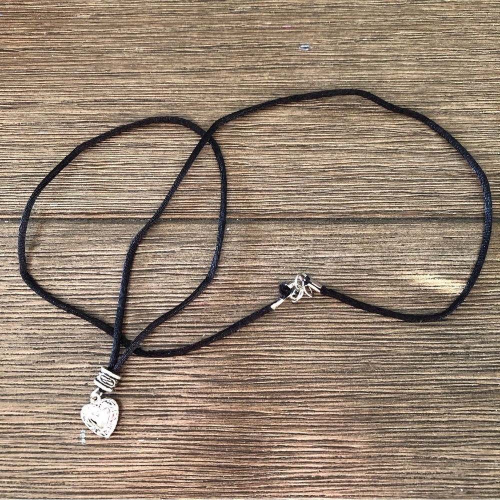 Metal heart and cord necklace